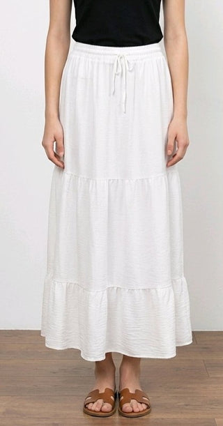 Ensfarvet nederdel, hvid