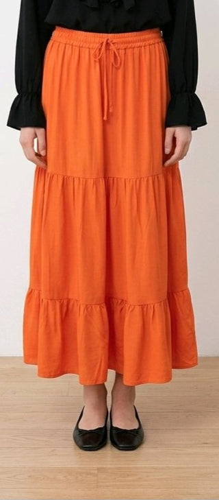 Ensfarvet nederdel, Orange