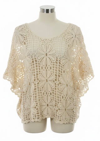 Blonde bluse med blomster. Beige