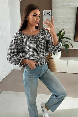 Skulderbar bluse med ternet mønster